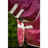 A maroon swish 100g lightweight stable rug with detachable neck burgundy and soft nylon lining straps and buckles