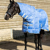Blue quilted lightweight stable rug with detachable neck cornflower color soft nylon lining and reflective stripes