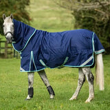 Navy blue medium weight turnout rug with detachable neck turnout and liner attachments featuring teal trim and reflective stripes