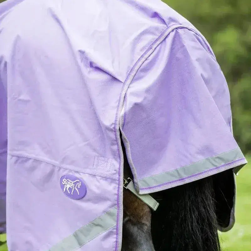 Lavender detachable neck turnout rug with reflective gray trim, tail flap, and circular brand logo on the side