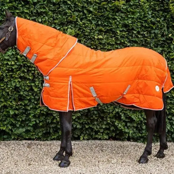 Bright orange swish 200g medium weight quilted neck stable rug with silver reflective straps and white trim