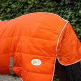 Bright orange 200g medium weight quilted neck stable rug with white trim and detachable neck patch detail