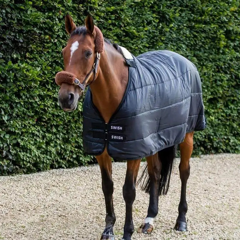 Dark gray quilted 300g horse rug liner with plush brown fleece collar and black straps from swish stable rugs