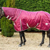 A maroon swish 360g heavy weight stable rug with detachable neck cover and adjustable straps featuring a logo