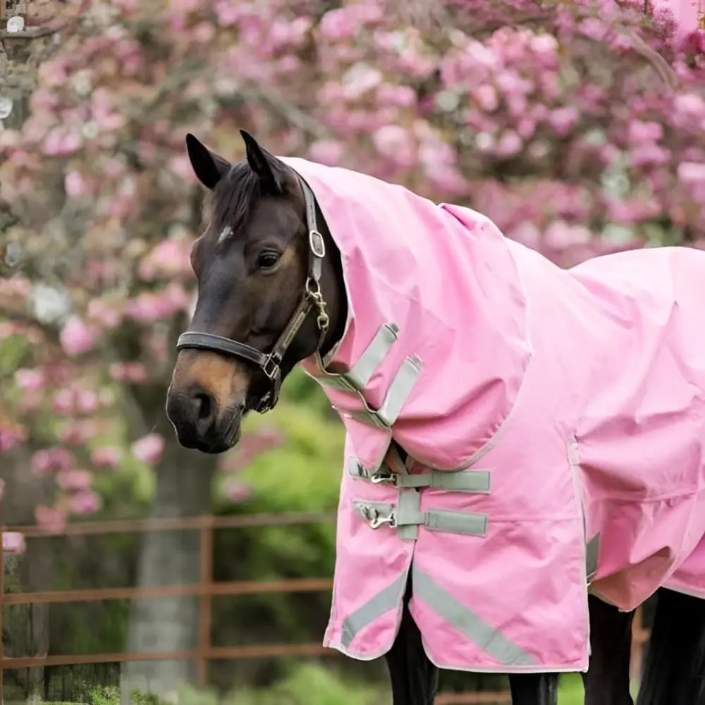 Swish 50g detachable neck turnout rug in baby pink with safety reflective strips and adjustable straps for waterproof use