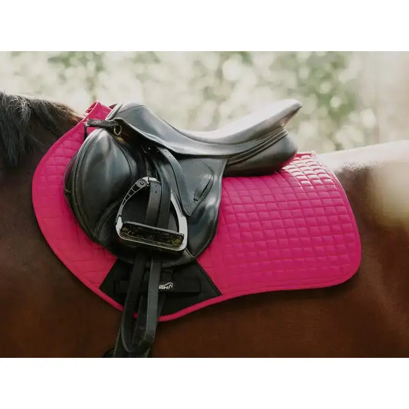 Bright pink quilted contact gp saddle pad with black trim and diamond stitch designed for high wither use saddle pad orange