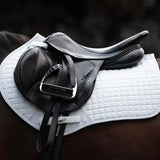 Black leather dressage saddle with silver stirrup iron on swish close contact gp saddle pad white with wicking properties