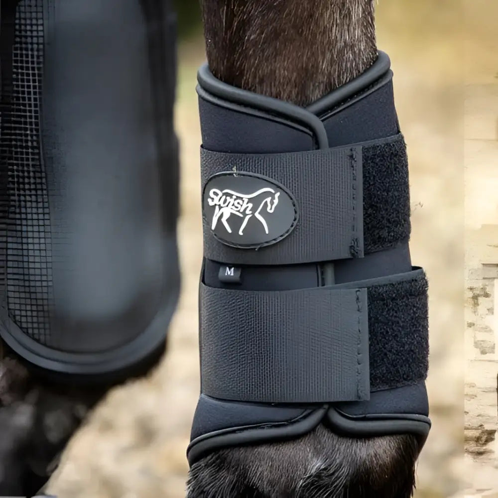 Black swish double locking brushing boots with velcro straps padded strike pad and breathable neoprene material