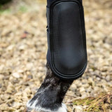 Black swish double locking brushing boots with padded strike pad breathable neoprene and carbon fiber texture