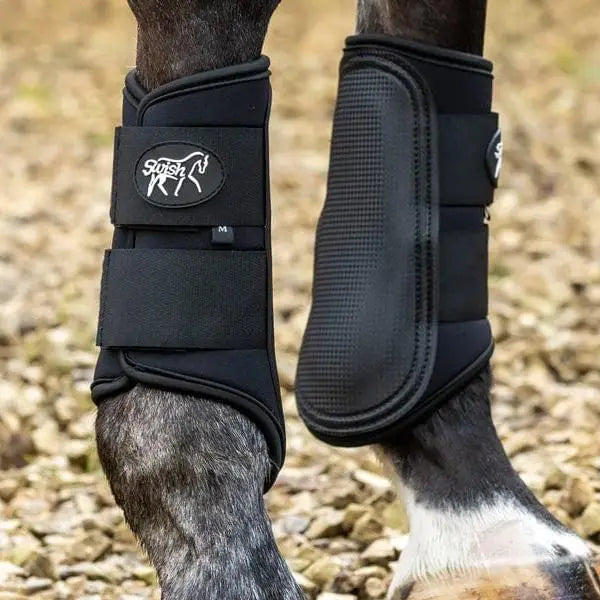 Black swish double locking brushing boots with padded strike pad breathable neoprene and saddle & trail logo strap