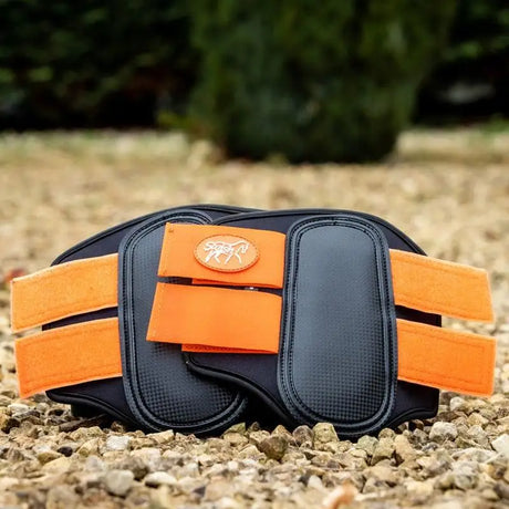 Black and orange swish double locking brushing boots with padded strike pad and breathable neoprene material