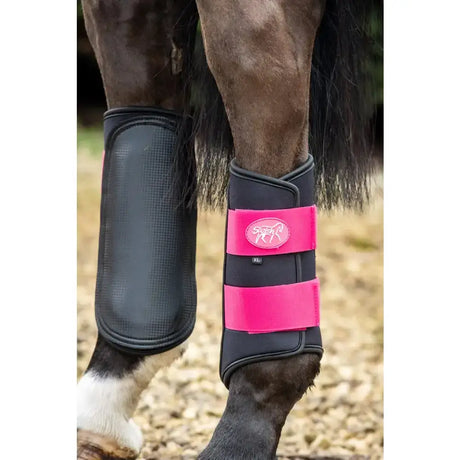 Swish double locking brushing boots in black and bright pink with padded strike pad and breathable neoprene material