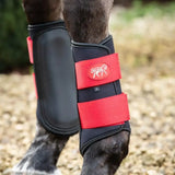 Black and red locking brushing boots with padded strike pad and breathable neoprene featuring squish logo strap