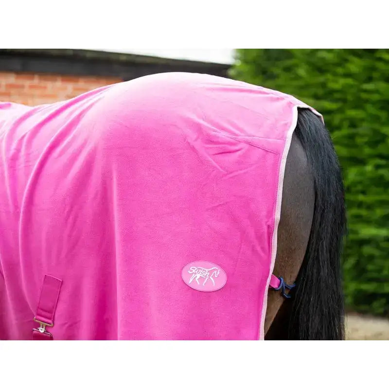 Bright pink luxury fleece rug mulberry with soft texture white trim and sporty oval logo patch for horses