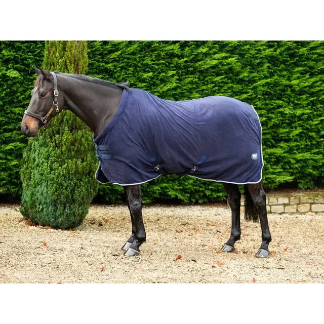 Navy fleece horse rug with white silver piping and breathable cross surcingles featuring sturdy metal buckles