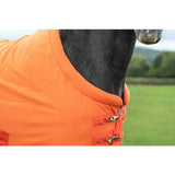 Bright orange fleece horse rug with quilted design and silver buckles perfect as a luxury fleece rug