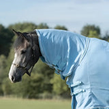 Light blue luxury fleece rug with neck cover silver piping and cross surcingles featuring adjustable straps and buckle closures
