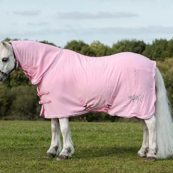 Pink fleece rug with hood and adjustable cross surcingles featuring silver piping and squish brand logo