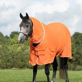 Bright orange luxury fleece rug with neck cover orange, white trim, buckle closures, and silver piping details