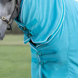 Turquoise swish fleece rug with neck cover featuring a horse fly veil white trim and adjustable straps luxury fleece