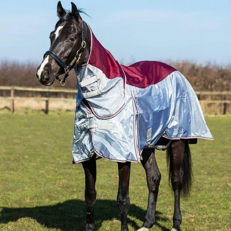 A maroon and silver reflective fly turnout rug with detachable neck cover and breathable nylon hood with adjustable straps