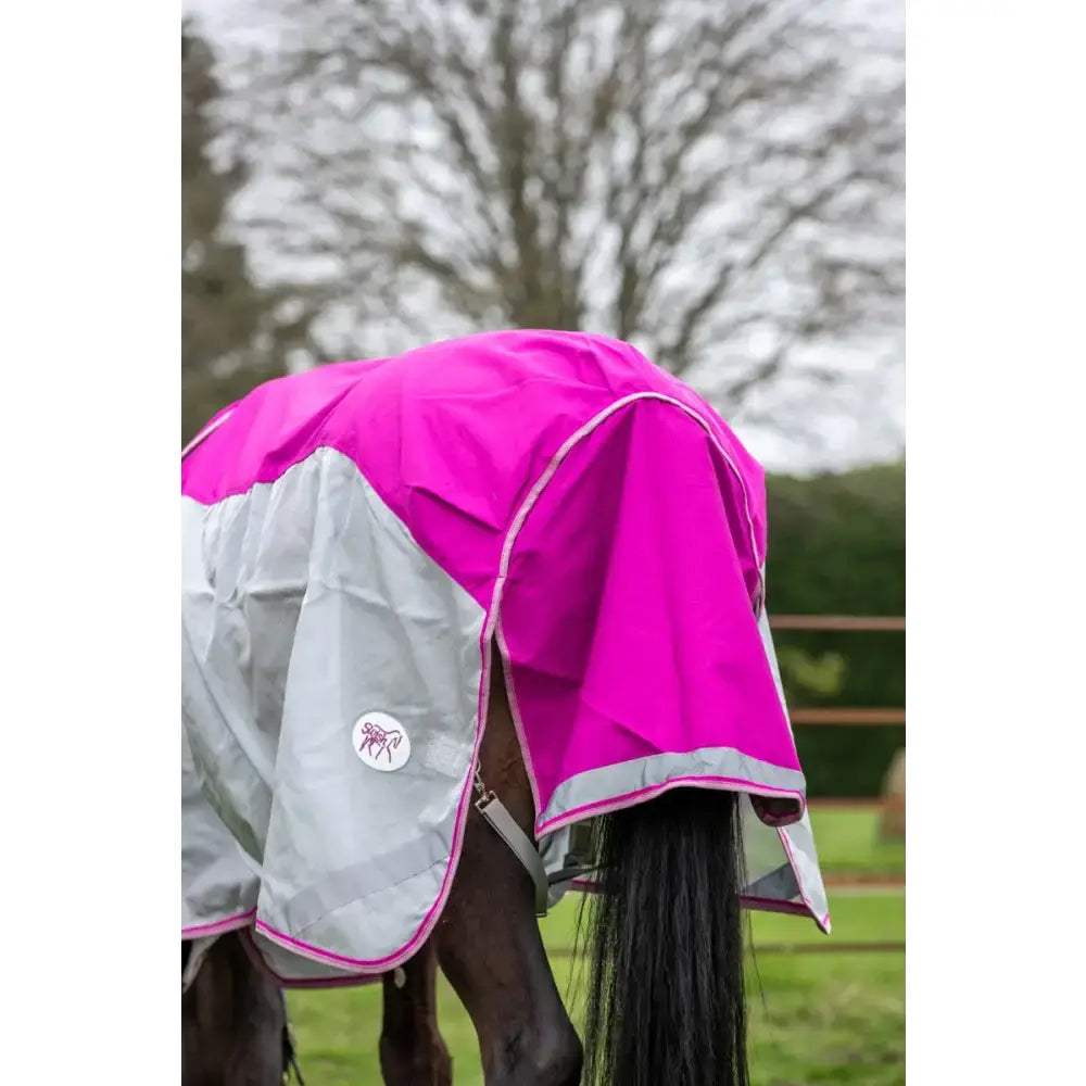 A vibrant mulberry rug swish fly turnout combination rug with reflective trim, circular logo patch, and detachable neck cover