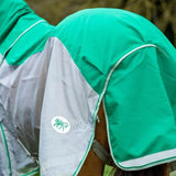 Teal and gray fly turnout combination with detachable neck cover and white trim featuring green logo patch