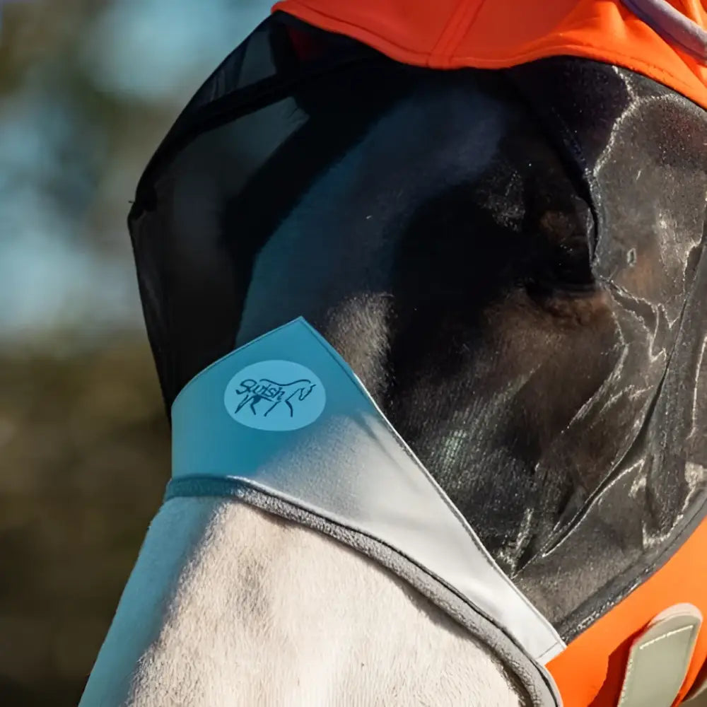 Orange and black swish horse fly mask with anti rub bindings and light blue brand patch on shoulder strap