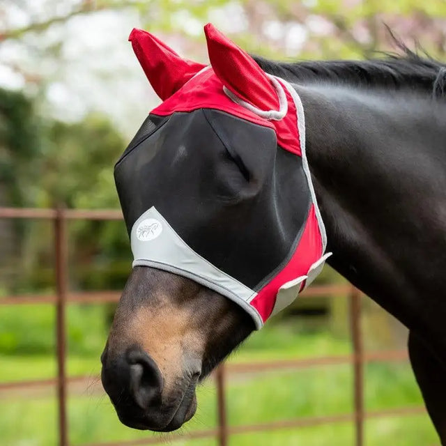 Red and black swish horse fly mask with white trim and pointed ear covers featuring anti rub protection