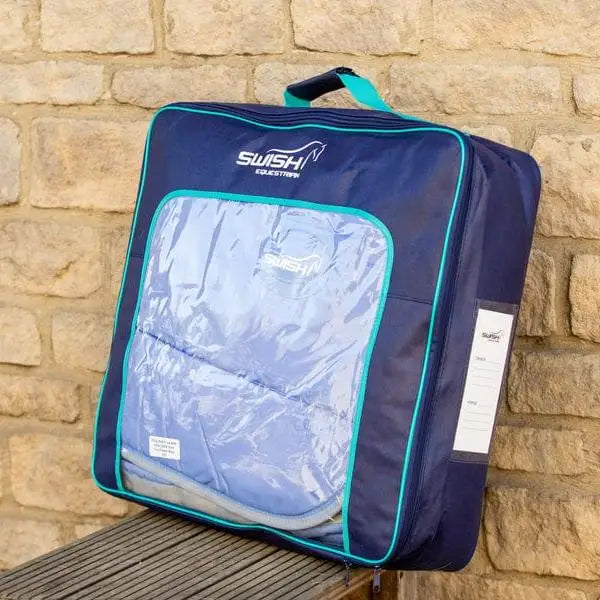 Navy blue swish horse rug storage bag with teal trim and clear window for easy heavyweight rug storage