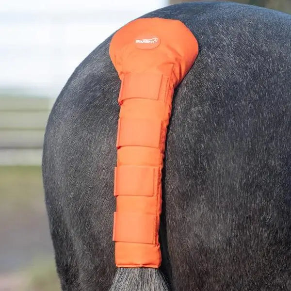 Bright orange swish horse tail guard with velcro straps and small logo for secure protection of horse tails