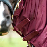 Maroon mesh fly rug with adjustable straps and gold-tone hardware featuring detachable neck cover and large tail flap
