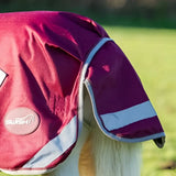 Swish mini 0g turnout rug burgundy with reflective silver stripes pink logo and cross surcingles for horses