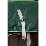 White adjustable surcingle extenders with silver metal hardware attached to green fabric for equestrian horses
