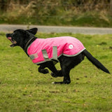Swish waterproof dog coat in high viz pink with reflective strips and velcro chest designed for outdoor use