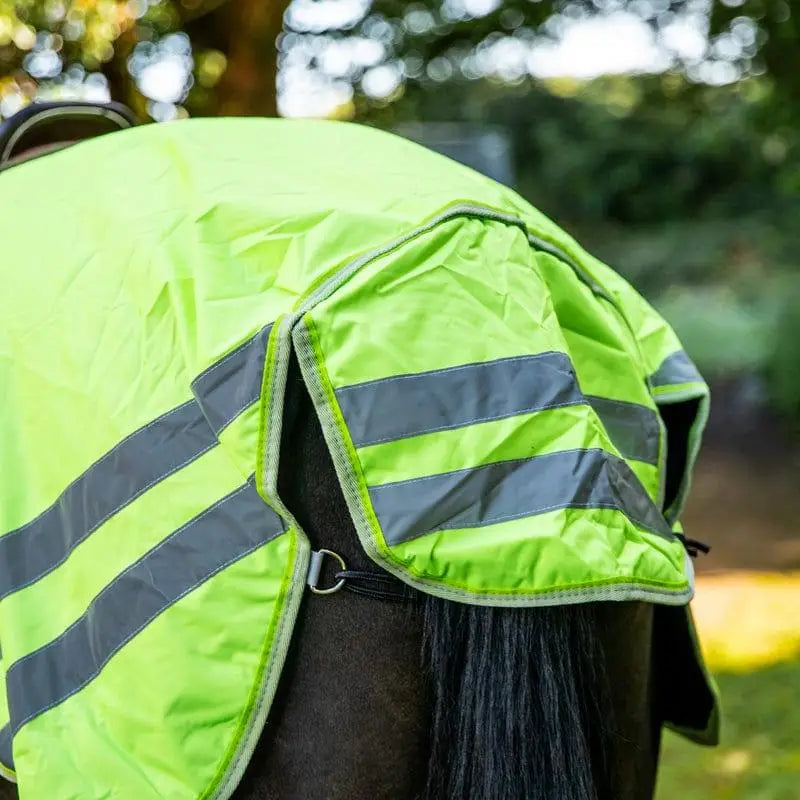 Bright lime green waterproof exercise sheet with reflective strips and metal buckle for high viz visibility