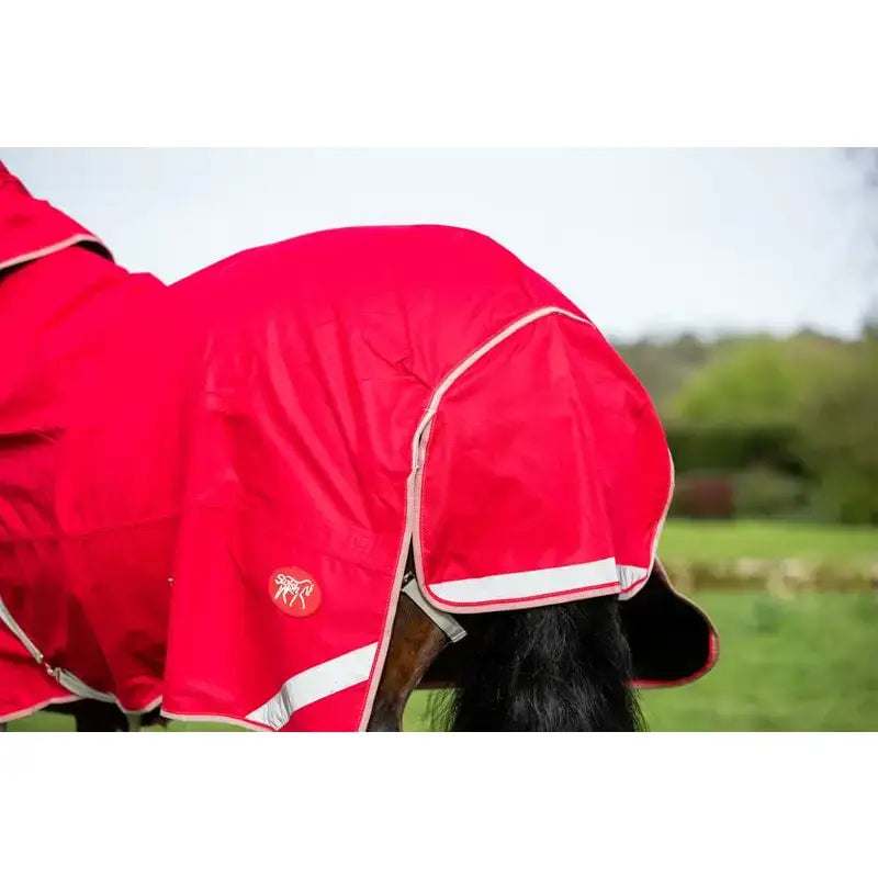 Bright red wide fit 100g detachable neck turnout rug with white trim reflective stripes and small logo on the side