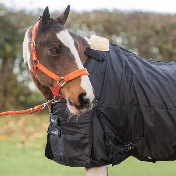 Black quilted wide fit 200g horse rug liner with orange halter and lead rope for extra comfort and warmth