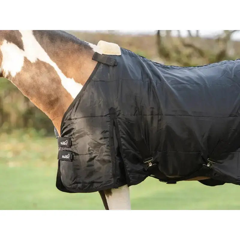 Black quilted swish wide fit 50g horse rug liner with adjustable straps and fleece lined collar for extra warmth