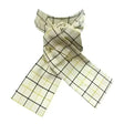 A cream-colored tattersall check riding stock with black and pale yellow grid pattern and gold-toned safety pins