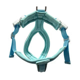 A light blue btactical harness with padded slip-on design, adjustable straps, and silver metal hardware for leash manners