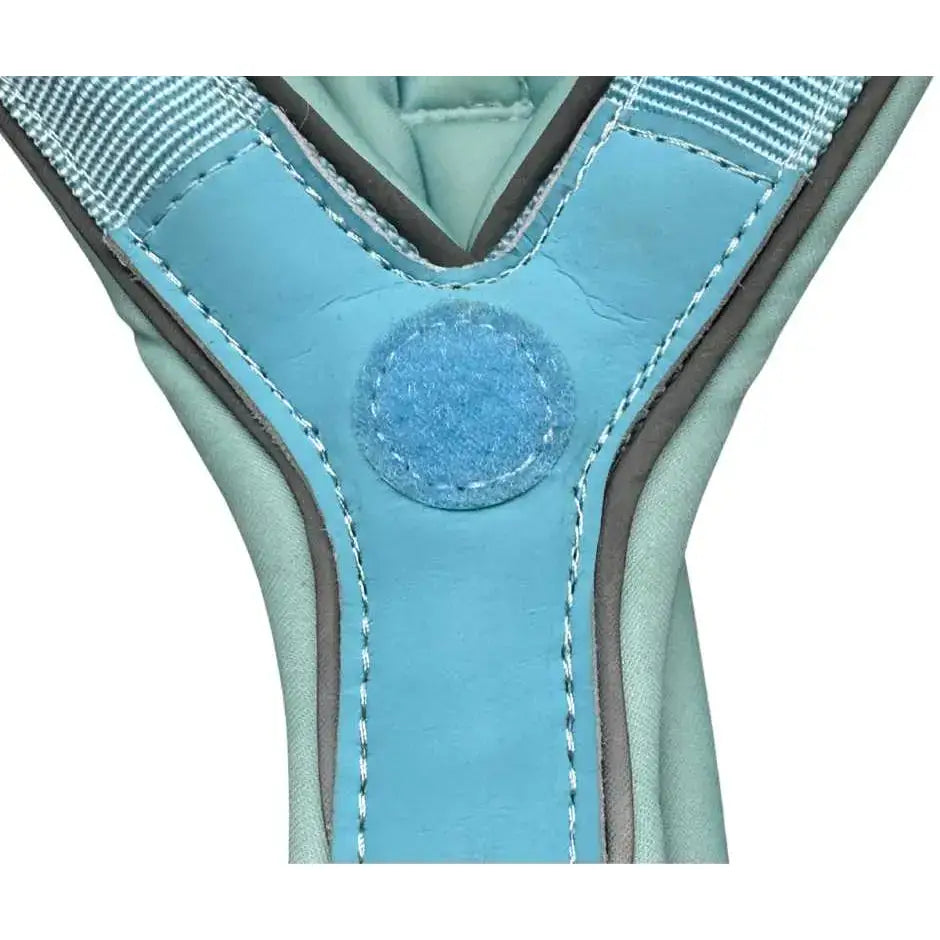 Light blue leather btactical harness with gray trim and white stitching features slip-on design for easy leash manners