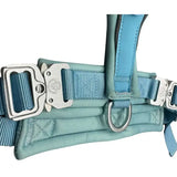 A light blue padded btactical harness with adjustable straps slip-on design and silver-toned metal hardware for leash manners