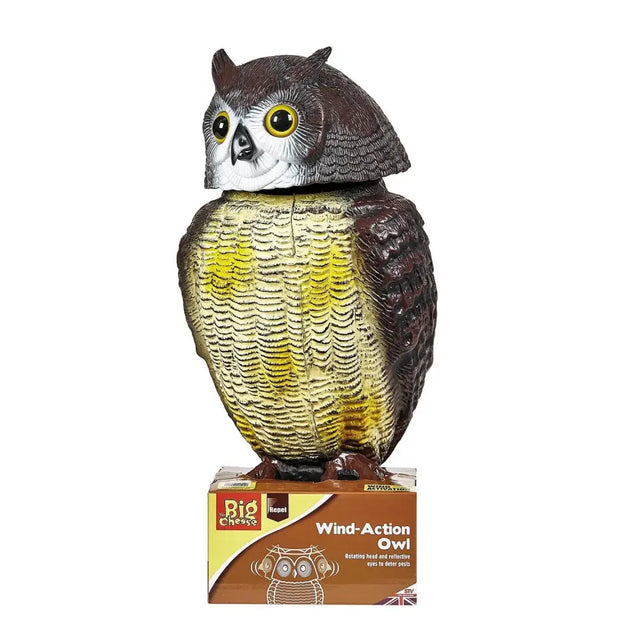 Brown and yellow plastic big cheese wind-action owl decoy with rotating head to protect from pests