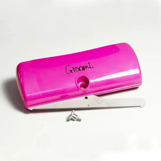 Bright pink groomi shedding brush electric hair trimmer with quick release detachable metal blade and small silver screws