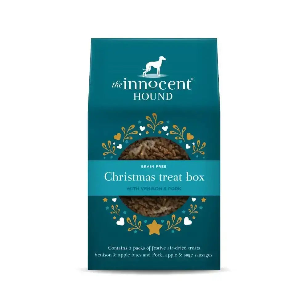 Teal innocent hound christmas treat box with festive gold and white decorations perfect for holiday gifting