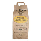 A brown paper bag of the organic feed company organic layers pellets farmyard layers feed weighing 5kg