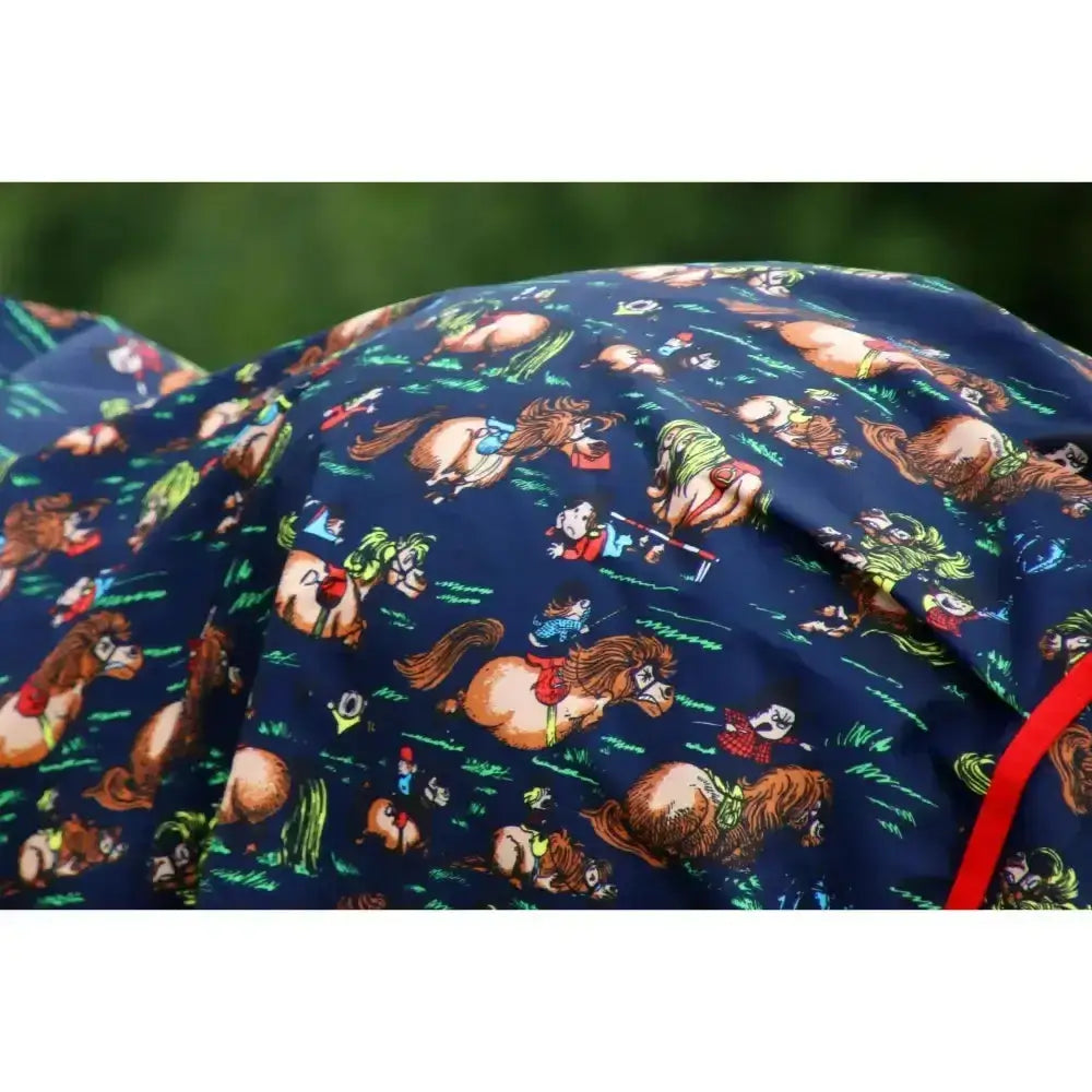 Navy blue thelwell rugs stormx original versatile mediumweight turnout blanket with cartoon horses and riders design