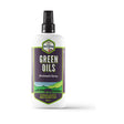 White plastic spray bottle labeled thomas pettifer green oils antiseptic spray with green and purple hills and horse design