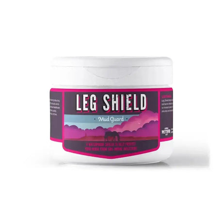 White plastic thomas pettifer leg shield mud guard with vibrant pink black label and mountain backdrop
